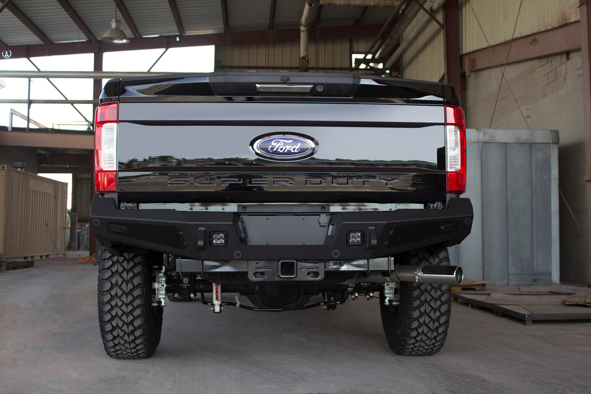 Addictive Desert Designs 17-18 Ford F-250 HoneyBadger Rear Bumper w/ Backup Sensor Cutouts - 0