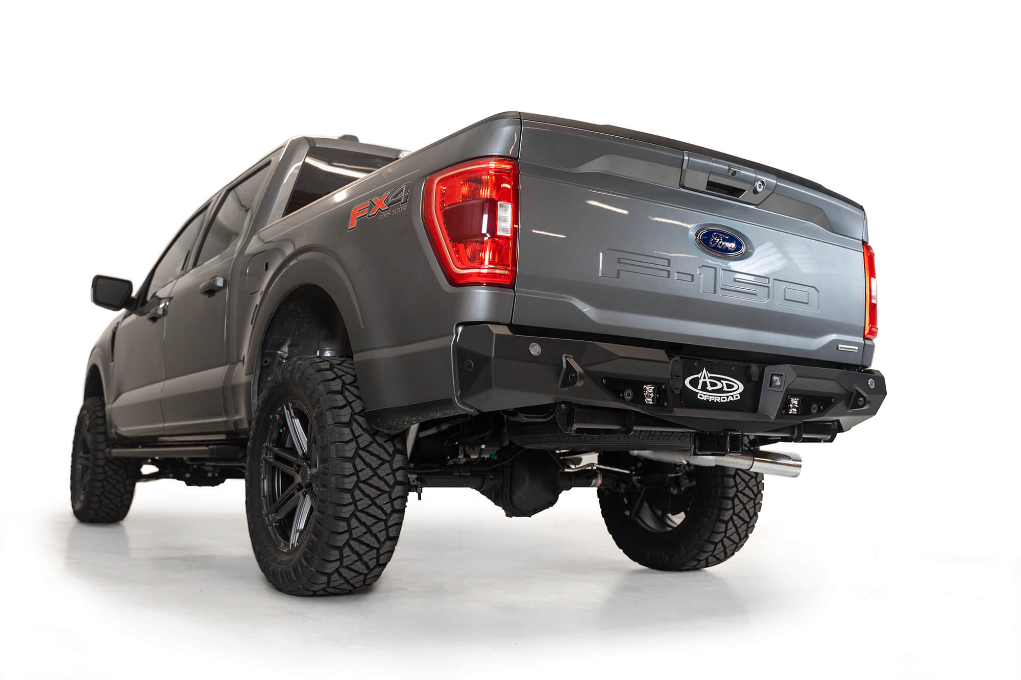 Addictive Desert Designs 2021 Ford F-150 Stealth Fighter Rear Bumper w/ Back up Sensors - 0