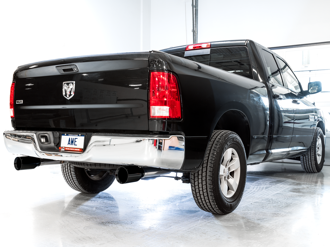 AWE 0FG Dual Rear Exit Catback Exhaust for 4th Gen RAM 1500 5.7L (with bumper cutouts) - Diamond Black Tips