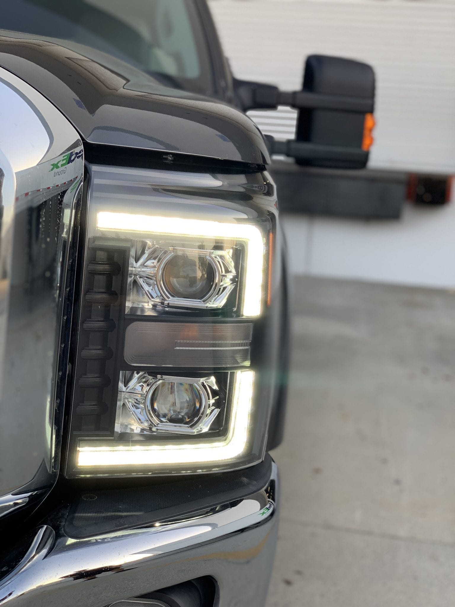 AlphaRex 11-16 Ford F-350 SD LUXX LED Proj Headlights Plank Style Alpha Blk w/Activ Light/Seq Signal