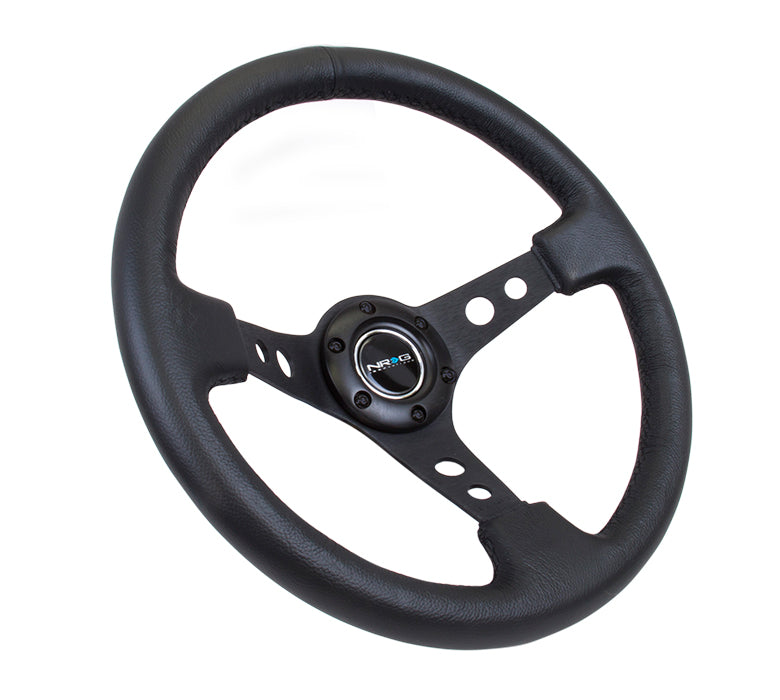 NRG Reinforced Steering Wheel (350mm / 3in. Deep) Blk Leather w/Blk Spoke & Circle Cutouts - 0