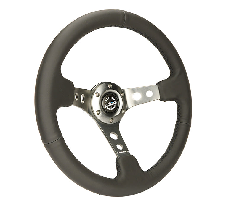 NRG Reinforced Steering Wheel (350mm / 3in. Deep) Blk Leather w/Gunmetal Circle Cutout Spokes - 0