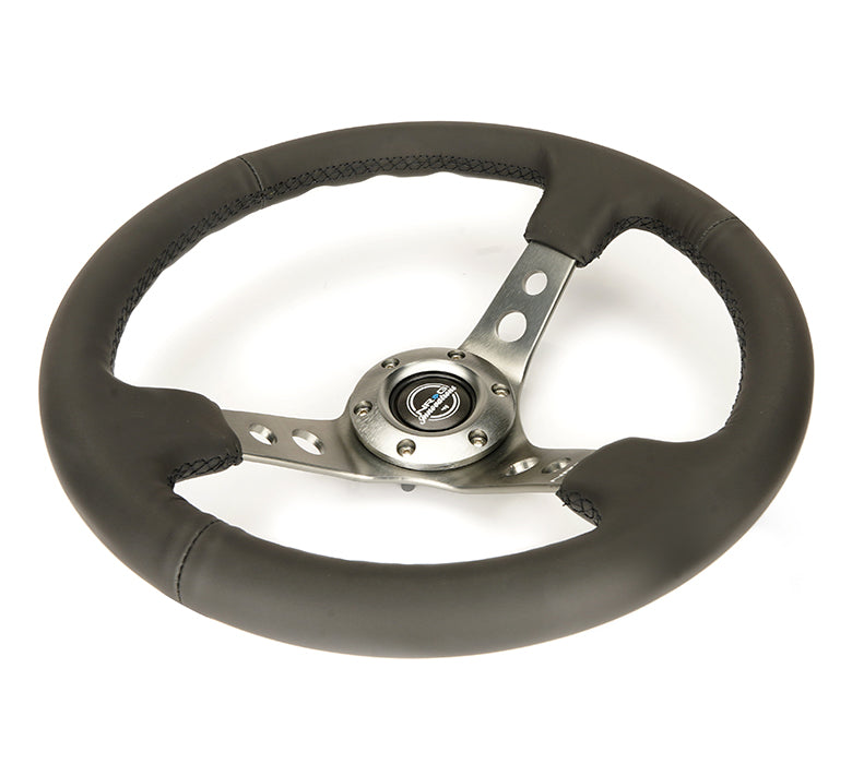 NRG Reinforced Steering Wheel (350mm / 3in. Deep) Blk Leather w/Gunmetal Circle Cutout Spokes