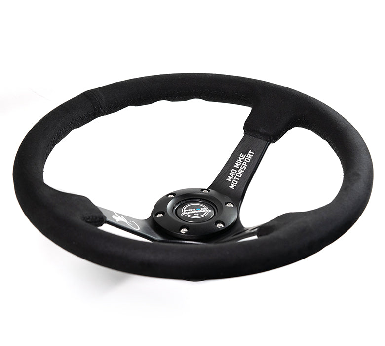 NRG Reinforced Steering Wheel (3in. Deep) Mad Mike /5mm Spoke/ Alcantara Finish/ Black Stitching - 0