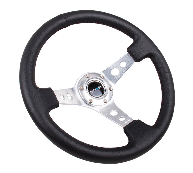 NRG Reinforced Steering Wheel (350mm / 3in. Deep) Blk Leather w/Silver Spoke & Circle Cutouts - 0