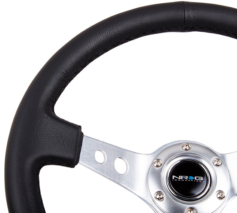 NRG Reinforced Steering Wheel (350mm / 3in. Deep) Blk Leather w/Silver Spoke & Circle Cutouts