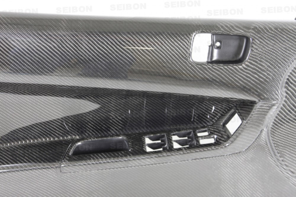 Seibon 08-12 Mitsubishi Evo Carbon Fiber Front Door Panels