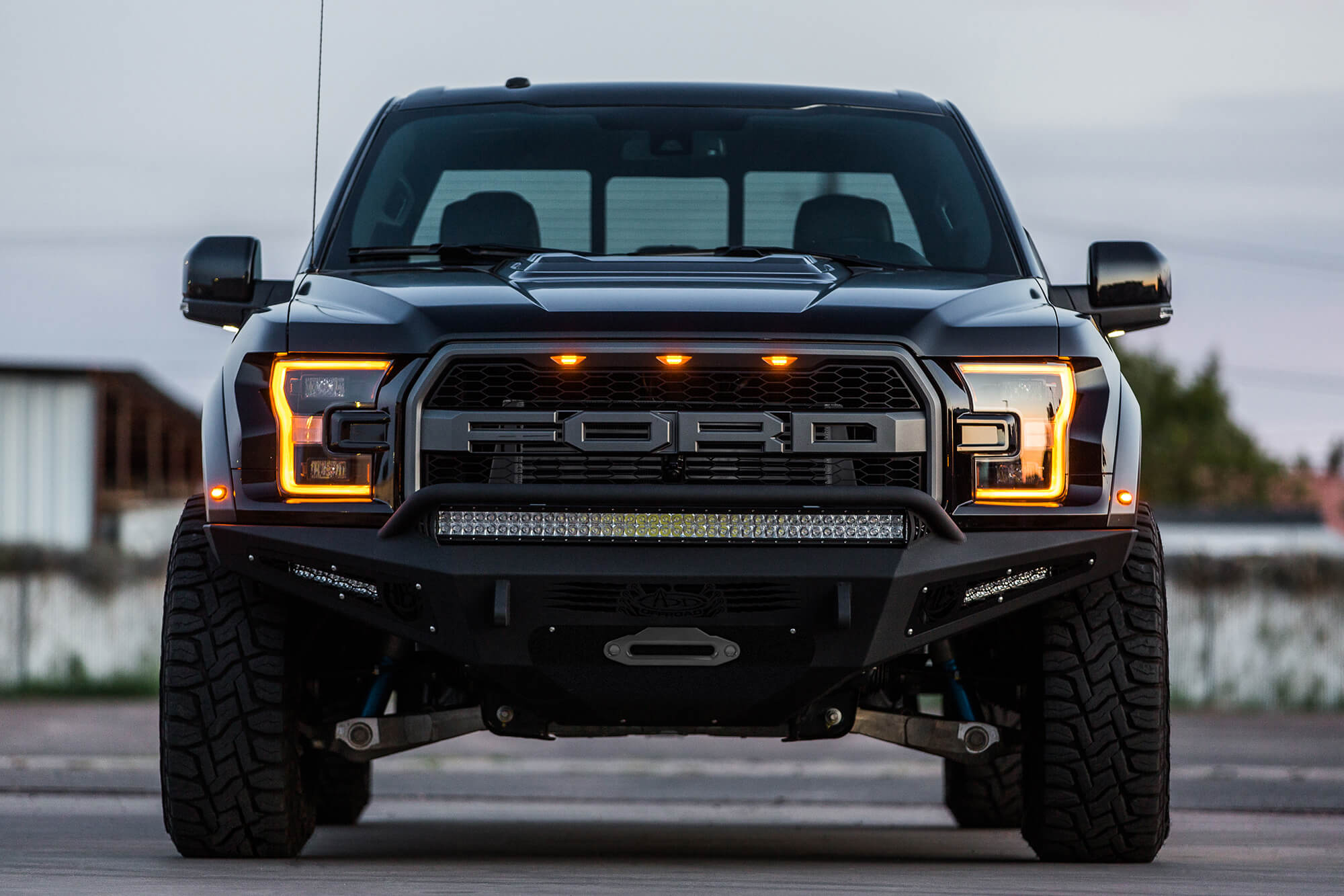 Addictive Desert Designs 17-18 Ford F-150 Raptor HoneyBadger Front Bumper w/ Winch Mount