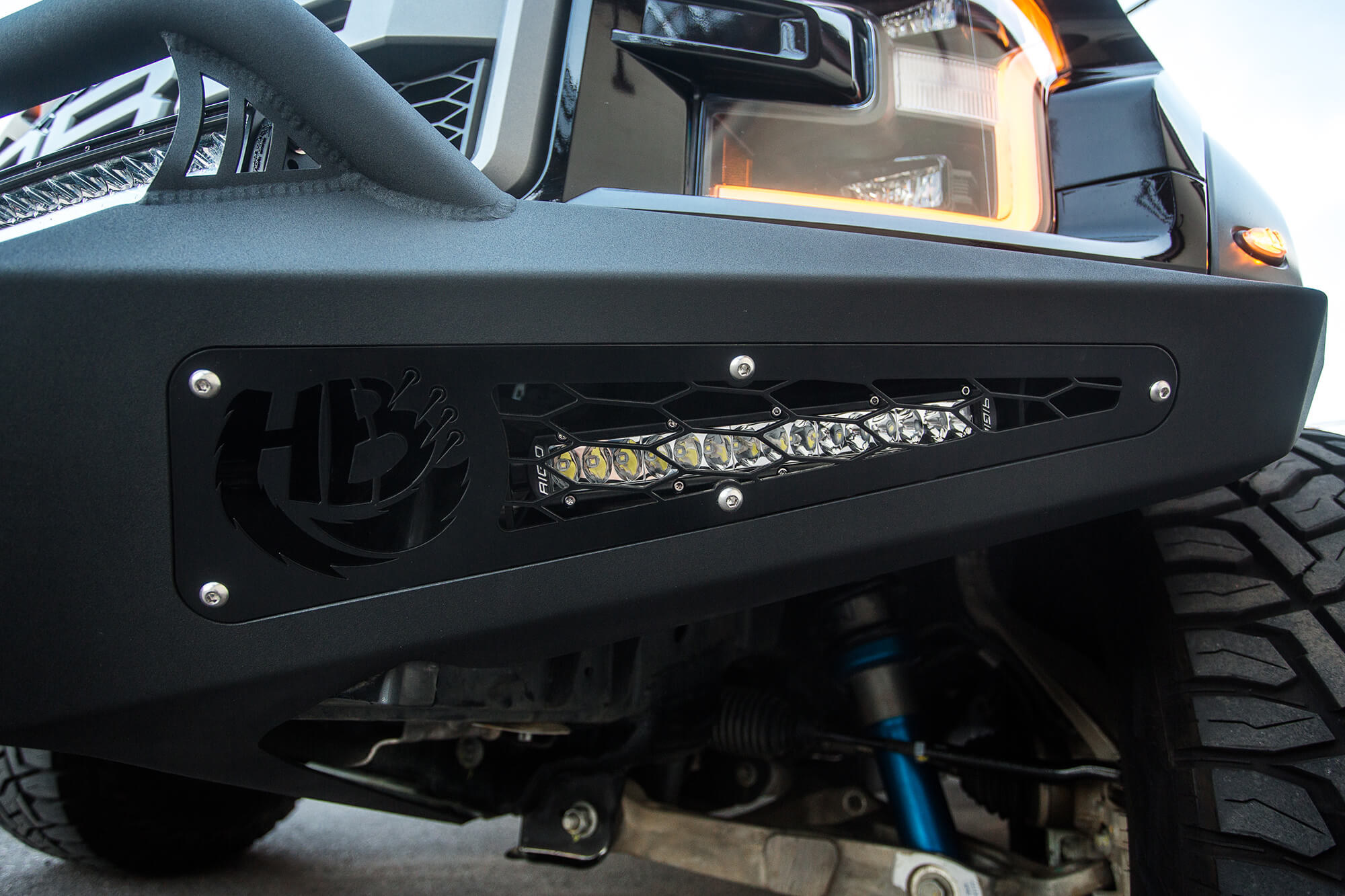 Addictive Desert Designs 17-18 Ford F-150 Raptor HoneyBadger Front Bumper w/ Winch Mount