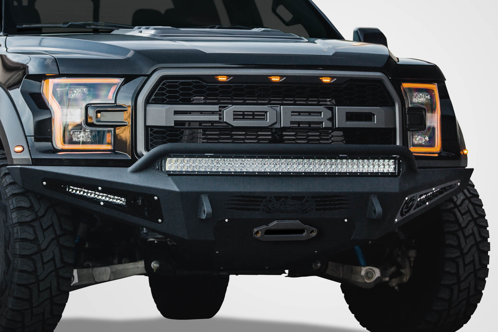 Addictive Desert Designs 17-18 Ford F-150 Raptor HoneyBadger Front Bumper w/ Winch Mount