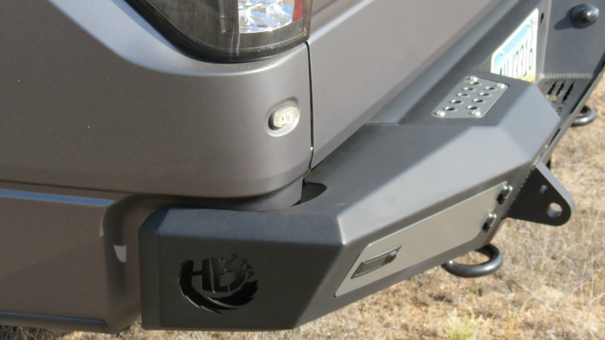 Addictive Desert Designs 10-14 Ford F-150 Raptor HoneyBadger Rear Bumper w/ Tow Hooks