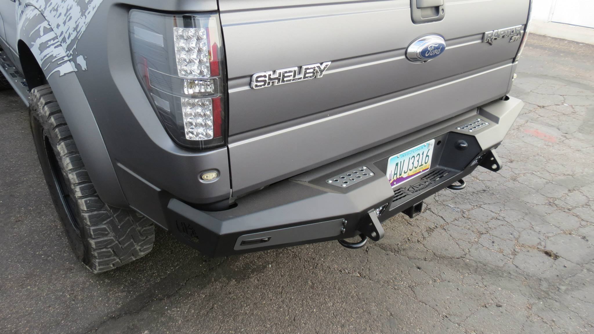 Addictive Desert Designs 10-14 Ford F-150 Raptor HoneyBadger Rear Bumper w/ Tow Hooks