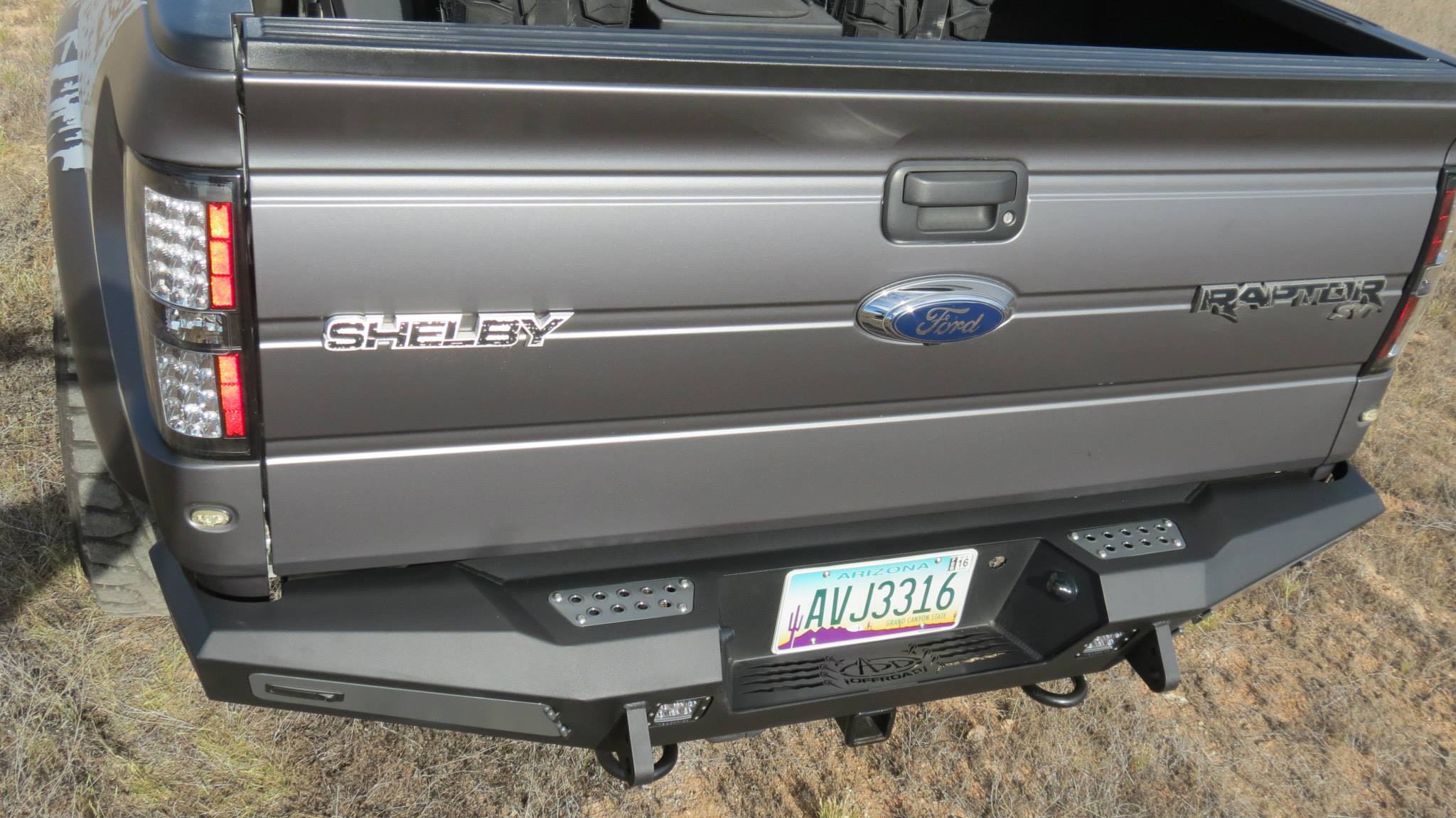 Addictive Desert Designs 10-14 Ford F-150 Raptor HoneyBadger Rear Bumper w/ Tow Hooks