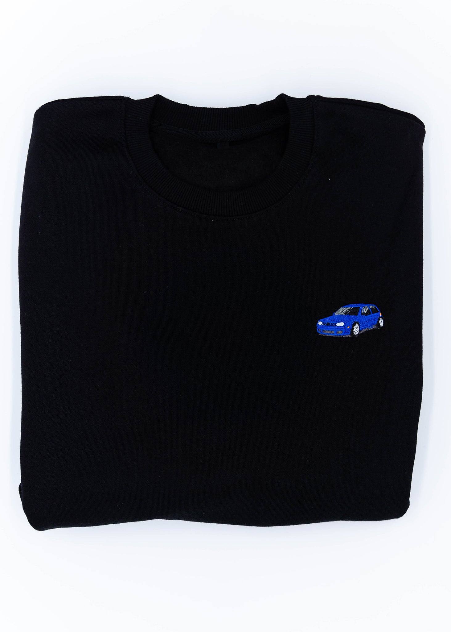 A black Mk4 Golf R32 crewneck sweater for men. Photo is a close up of the sweater with an embroidered Mk4 Golf R32. Fabric is a cotton and polyester mix and high quality and fits to size. The style is long sleeve, crew neck, and embroidery on left chest.